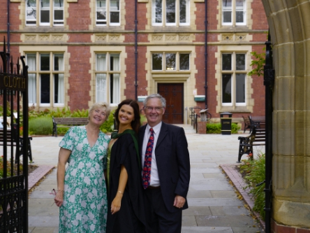 Family again, under the archway.